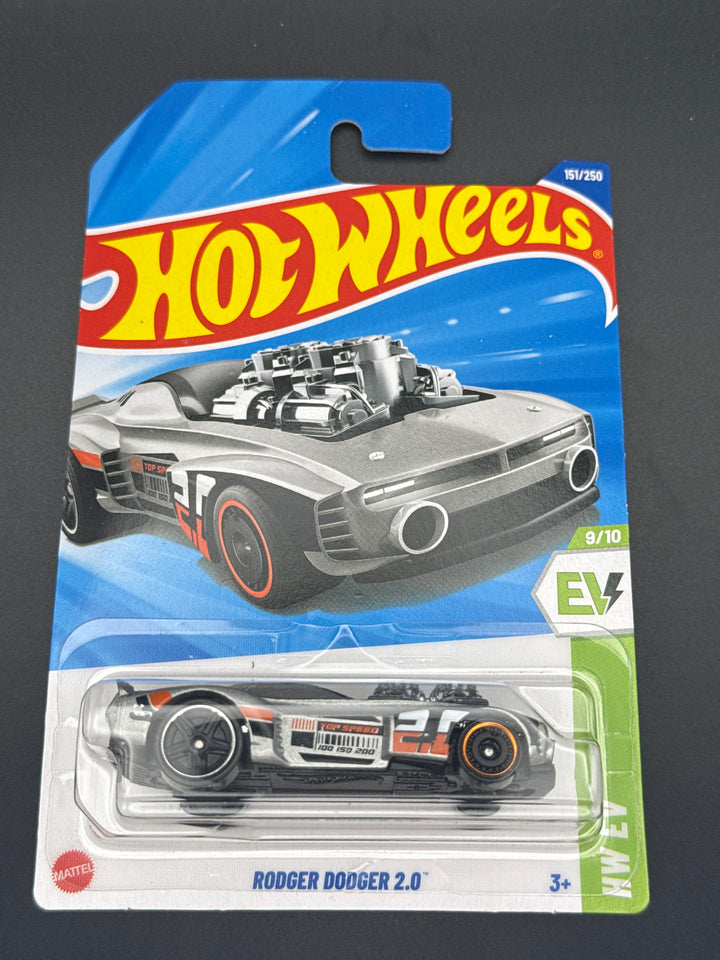 Hot Wheels Rodger Dodger 2.0 in grey on its mainline blister card, HW EV series