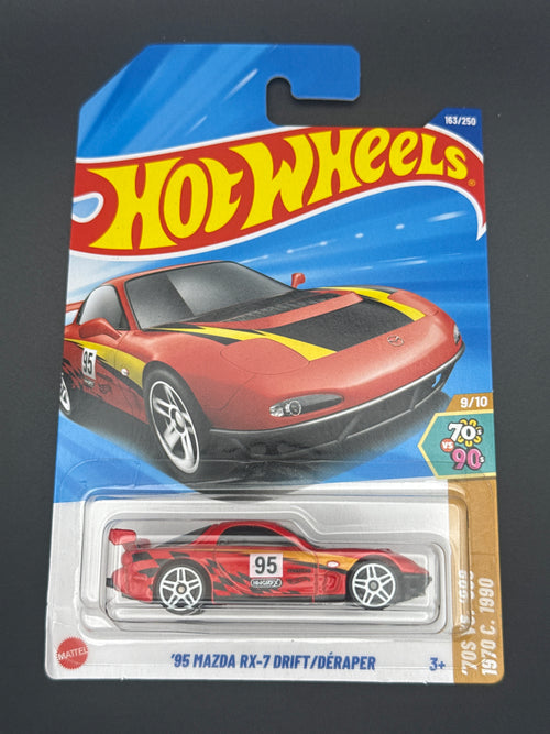 Hot Wheels '95 Mazda RX-7 Drift in red, number 95, on its mainline blister card, HW '70s vs '90s series