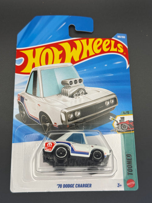 Hot Wheels Tooned '70 Dodge Charger in white with blue stripes on its mainline blister card